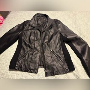 Faux leather jacket. Size XL but fits more like a large to me. Black!Super cute!